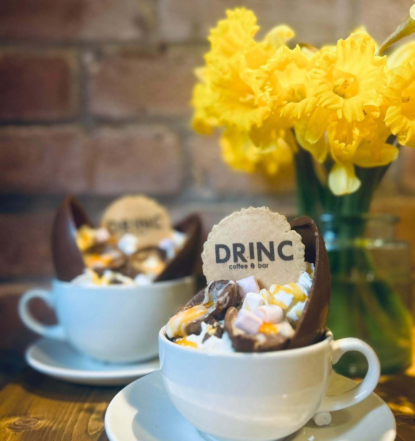 Easter hot chocolate with marshmallows and DRINC branded biscuit at DRINC Coffee Bar Ramsbottom